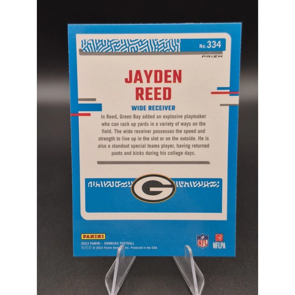 2023 Donruss Optic Jayden Reed #334 Rated Rookie Blue Scope Prizm SP Green Bay